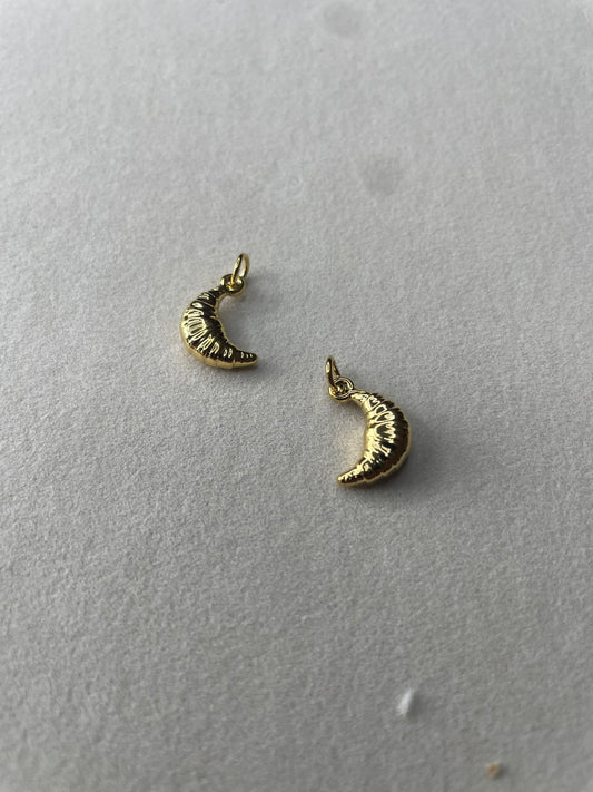 Elegant croissant-charm – en smakfull detalj